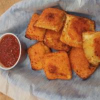 Fried Cheee Ravioli · 8 breaded, fried cheese ravioli squares. Comes with a side of marinara.