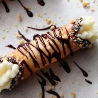 Canoli · Tender, sweet tubes of pastry crust filled with a slightly sweet marscarpone and ricotta che...