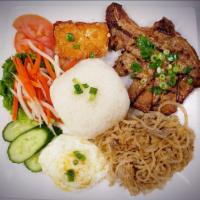20. Thien Hoang Special Rice Dish · Served with broken rice, bean curd skin, lemongrass pork or pork chop, shredded pork skin an...