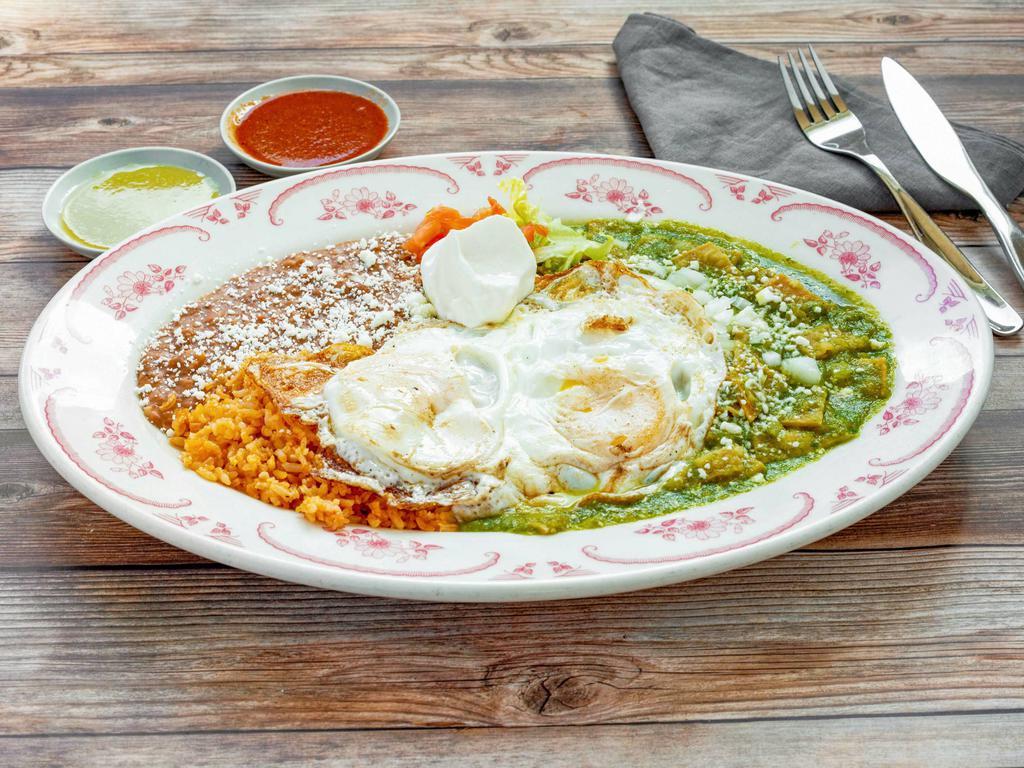 Huevos Divorciados · 3 eggs over easy, served with red and green salsa with Cotija cheese. Served with flour or corn tortilla.