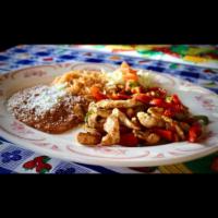Chicken Carnitas · Chicken strips, cooked and mixed with onions, mushrooms, green bell peppers and tomato.