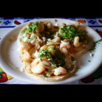 Street Taco · 1 single taco with doubled corn tortillas, cilantro and onions, with your choice of meat (as...