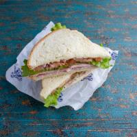 Little Italy Sandwich Combo · Basil mayo, provolone cheese, and ham topped with red onion, tomato, lettuce and Italian dre...