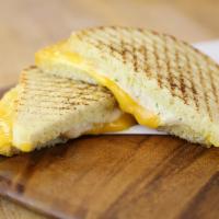 Great Grilled Cheese Sandwich · 3 slices of cheese(2 cheddar slices and 1 swiss slice) with garlic herb spread, grilled on o...