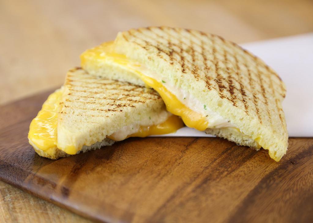 Great Grilled Cheese Sandwich Combo · 3 slices of cheese(2 cheddar slices and 1 swiss slice) with garlic herb spread, grilled on our sourdough bread.