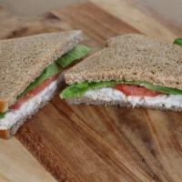 Tasty Tuna Sandwich · All white albacore on our honey whole wheat bread. Made with our own seasoned mayo, topped w...