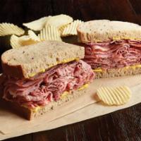 Hot Pastrami Sandwich · 1/2 lb. of hot pastrami and choice of bread. Served with chips or baked chips.