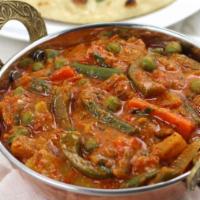 Mixed vegetable Curry · Mixed vegetables like fresh green peas, carrots, broccoli, cauliflower, zucchinis, cooked in...