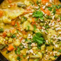 Veggie Korma · Fresh vegetables like green peas, carrots, broccoli, cauliflower, zucchinis, cooked in onion...