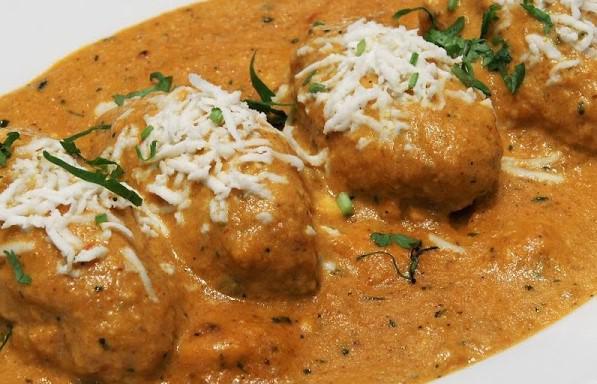 Malai Kofta · Homemade cheese balls called “kofta” made with mashed potatoes, paneer, carrots and other spices combined, then cooked with specially prepared tomatoes and onion creamy sauce mix in combination with Himalayan herbs & spices.