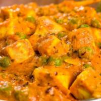 Mutter Paneer · Homemade cheese cubes, peas cooked in creamy onion and tomato sauce with the perfect combina...
