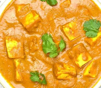 Paneer Tikka Masala · Homemade cheese cubes cooked in creamy onion and tomato sauce with the perfect combination of Himalayan herbs & spices.