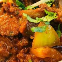 Lamb Kadai · Tender boneless lamb mixed with green peppers, and onions cooked together in a perfect combi...