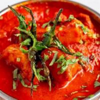 Shrimp Vindaloo · Shrimp cooked with potato in onion and tomato gravy with the touch of vinegar mixed together...