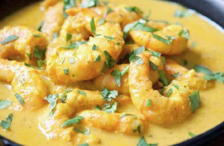 Shrimp Korma · Shrimp cooked in a onion sauce and a cream mixed with other Himalayan herbs and spices and then garnish with shredded coconut, cashew and raisin.