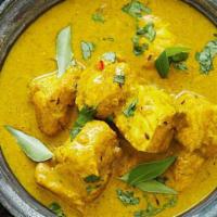Salmon Korma · Salmon cooked in a onion sauce and a cream mixed with other Himalayan herbs and spices and t...