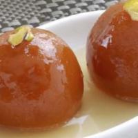 Gulab Jamun · Juicy and sweet milk balls.