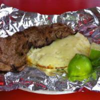 Asada · Grilled steak served with an arepa with mozzarella cheese topping and pico de gallo is optio...