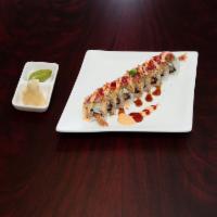 Michi Roll · Shrimp tempura, crab salad and cream cheese topped with fresh avocado, seared tuna, teriyaki...