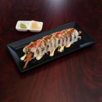 McDermott Roll · 1 large roll with shrimp tempura, spicy tuna and crab salad topped with fresh avocado, seare...