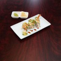 Matty Roll · Shrimp tempura and spicy tuna topped with fresh avocado, seared tuna, lemon, citrus ponzu, g...