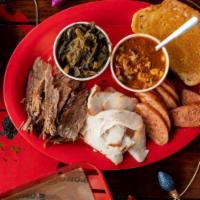 Three Meat Platter · Choose your three favorite meats. Served with garlic toast and two sides