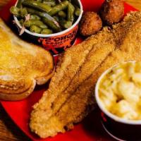 Fried Fish Platter · Our popular fried Swai white fish. Served with garlic toast and two sides.