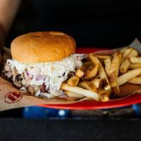 Slawpy Pig · A generous portion of pulled pork topped with cole slaw