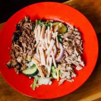 BBQ Salad · Fresh greens topped with your choice of bbq pulled pork, turkey, or beef brisket. Salad topp...