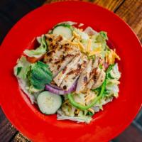 Grilled Chicken Salad · Fresh greens topped with a marinated, chargrilled chicken breast. Salad toppings include
ch...