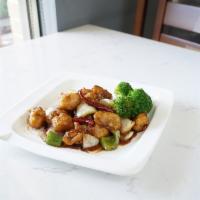 General Tso Chicken · Stir-fried chicken with bell pepper, onion and dried chilli in house-made brown sauce. Spicy.