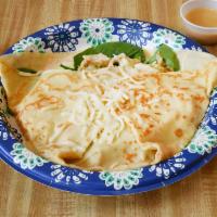 Artichoke Crepe · Mozzarella, feta cheese, chicken, artichoke hearts, spinach, garlic and creamy pesto.