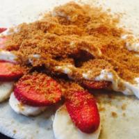 Lotus Biscoff Crepe · Biscoff crumbles, cheesecake sauce, with whip cream and powder sugar.