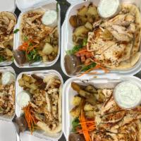 Chicken Souvlaki Platter Lunch  · Served with pita bread, French fries, tzaziki sauce  and salad.