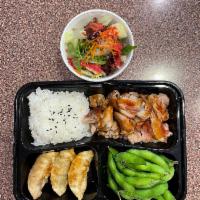 Chicken Bento · Chicken teriyaki with rice, 3 pcs fried dumplings, edamame, and salad