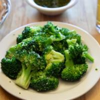 Broccoli · Sauteed with garlic and white wine.