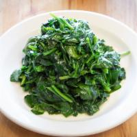 Spinach · Sauteed with garlic and white wine.