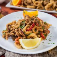 Calamari Fritti · Fried calamari, pickled peppers, spicy marinara and horseradish crema.