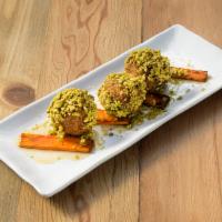 Mimi's Goat Cheese · Fried goat cheese, honey, pistachio, roasted carrots.