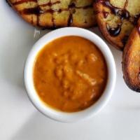 Side of Housemade Buffalo Sauce · Want to turn up the heat? This super spicy sauce is perfect for dipping or dressing! 