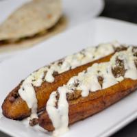 2 Canoas de Platano · 2 Sweet plantain canoes. Stuffed with ground beef, cheese, beans, cream and pico de gallo.