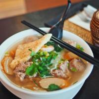 House Noodle Soup · Flat noodle, ground pork, pork ball, fish ball, fish cake, shrimp and fried wonton skin in b...