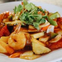 Sweet and Sour · Stir-fried bell pepper, onion, pineapple, cucumber and tomato in sweet and sour sauce.