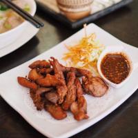 Fried Jerky · Your choice of marinated beef or pork fried to perfection served with chili sauce.