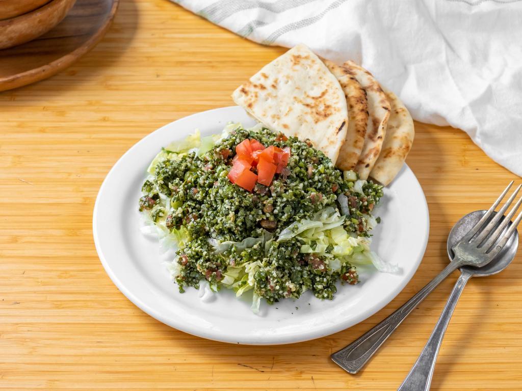 Tabbouli Salad and Pita  · Chopped parsley, tomato, green onions, mint, cracked wheat, olive oil, lemon juice and salt. 