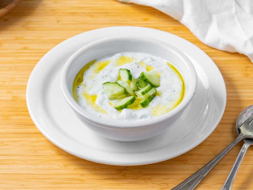 Cucumber and Yogurt Salad  · English, cucumber, nonfat yogurt, garlic, salt and dried mint. 