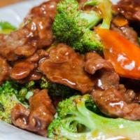 74. Beef with Broccoli · Served with rice. 
