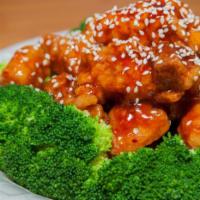 S9. Sesame Chicken · Chunks of chicken lightly fried to crispy in brown sauce, served with roasted sesame seeds o...