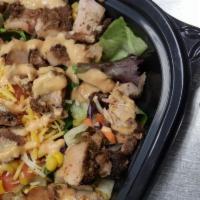 Jerk Chicken Salad Combo · Our boneless chicken breast and thighs seasoned in our signature Jerk sauce are slow-cooked ...