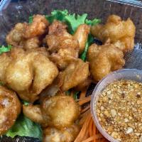 9. Shrimp Tempura · 9 pieces. Golden fried shrimp in tempura batter served with sweet & sour sauce and ground pe...